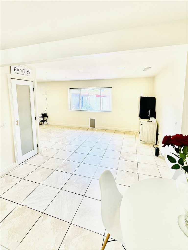 8735 Calaveras Avenue Rancho Cucamonga, CA 91730 - Photo 11 of 52 a view of a living room and bathroom