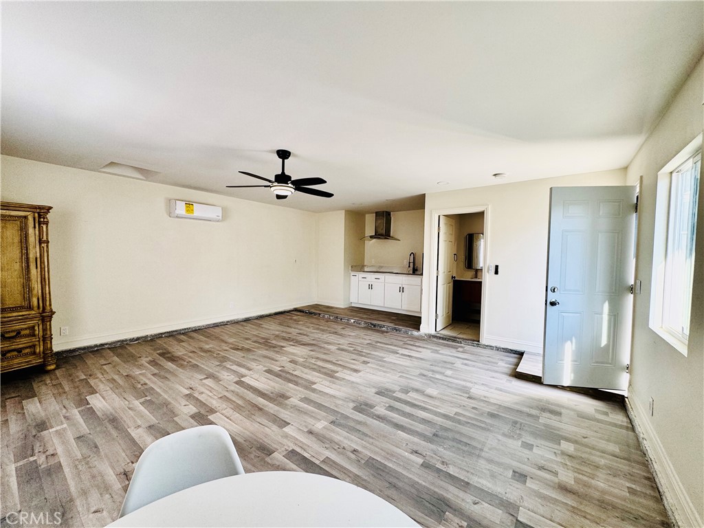 8735 Calaveras Avenue Rancho Cucamonga, CA 91730 - Photo 27 of 52 a view of empty room with wooden floor