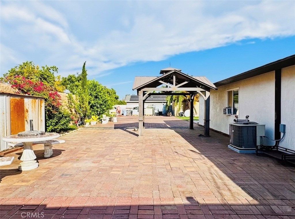 8735 Calaveras Avenue Rancho Cucamonga, CA 91730 - Photo 33 of 52 a house with yard and a outdoor space