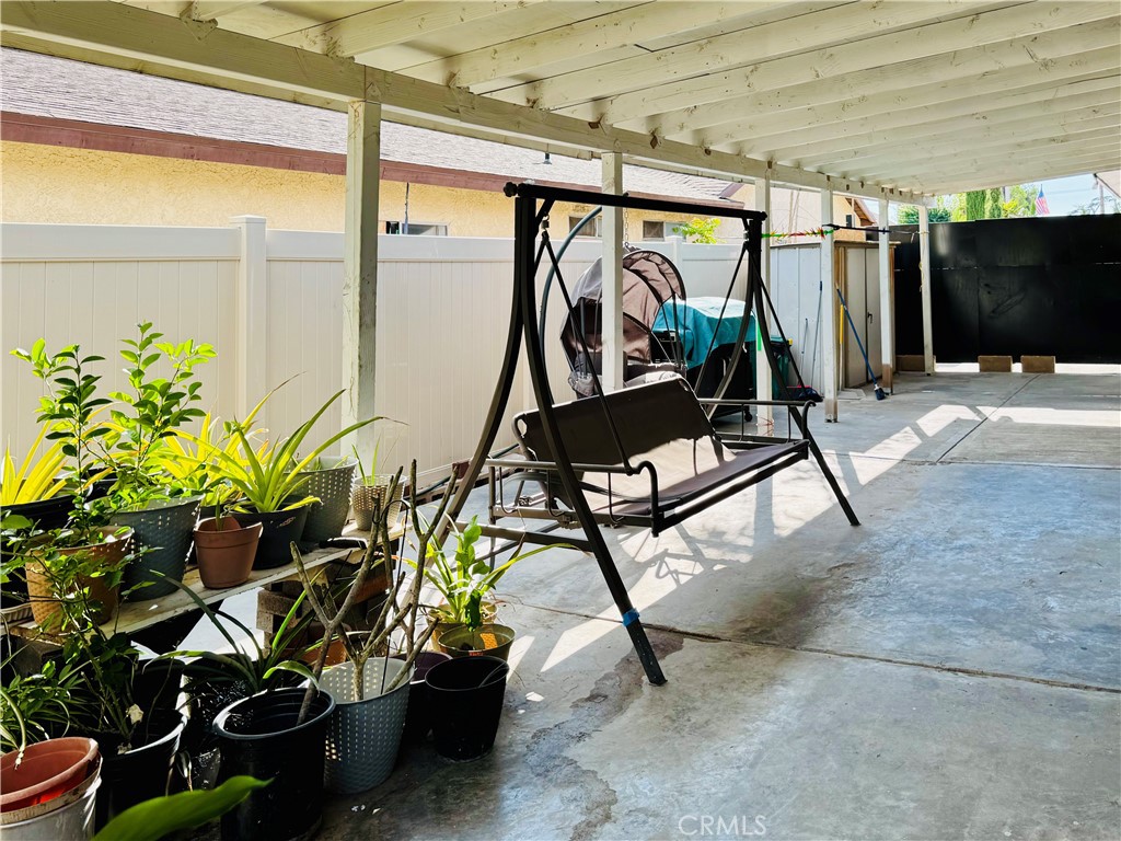 8735 Calaveras Avenue Rancho Cucamonga, CA 91730 - Photo 36 of 52 a view of a room with lots of potted plants
