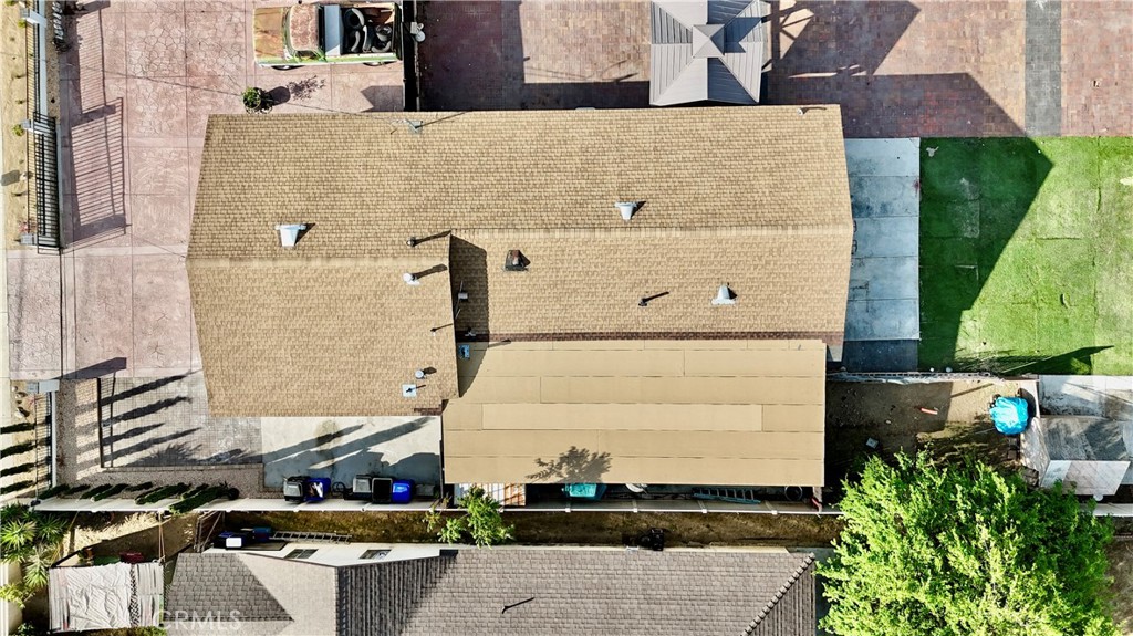 8735 Calaveras Avenue Rancho Cucamonga, CA 91730 - Photo 47 of 52 aerial view of a house with a yard