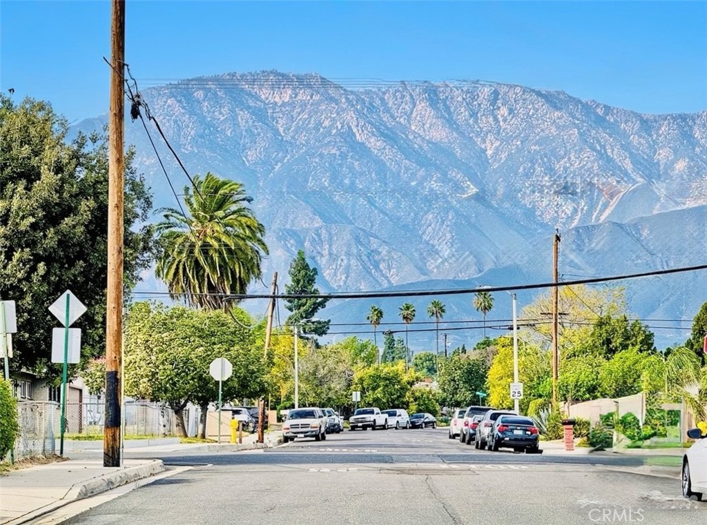 8735 Calaveras Avenue Rancho Cucamonga, CA 91730 - Photo 49 of 52 a view of a street with a building in the background