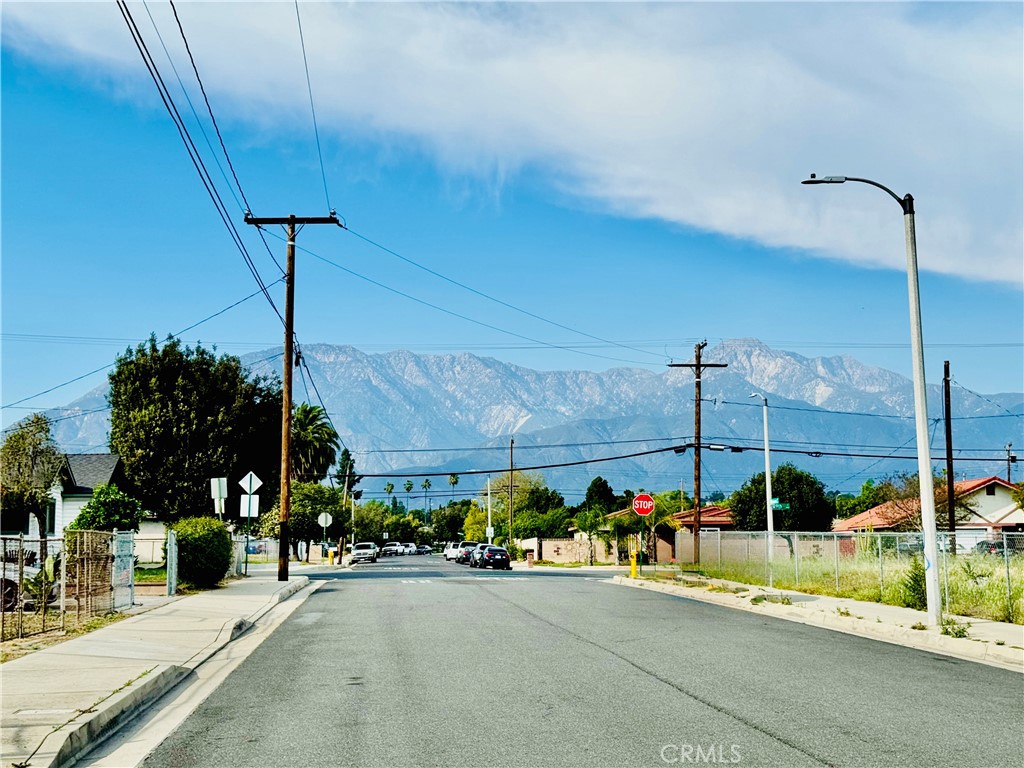 8735 Calaveras Avenue Rancho Cucamonga, CA 91730 - Photo 50 of 52 a view of a road with a building in the background
