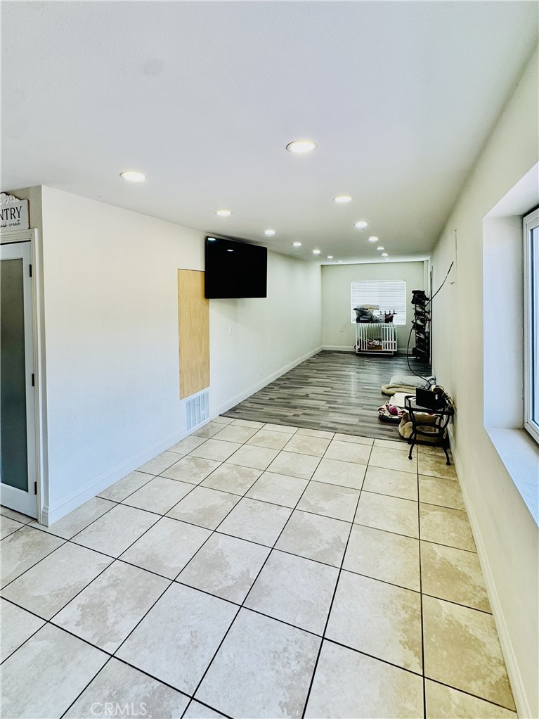 8735 Calaveras Avenue Rancho Cucamonga, CA 91730 - Photo 9 of 52 a view of a kitchen with a sink and a stove top oven