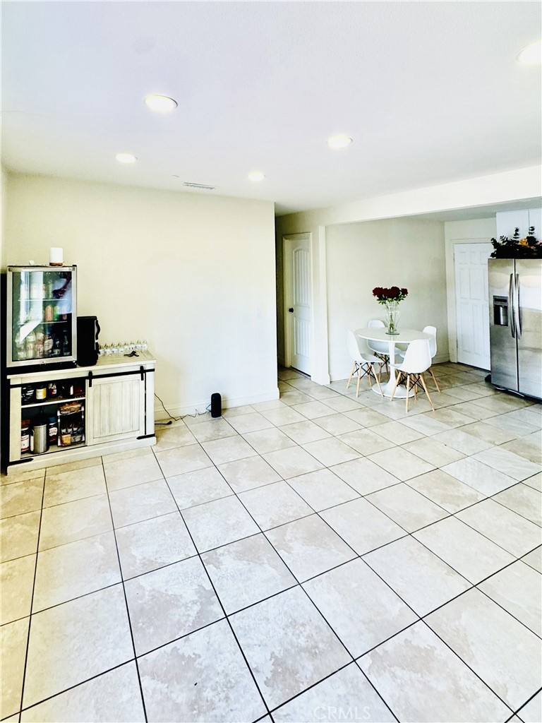 8735 Calaveras Avenue Rancho Cucamonga, CA 91730 - Photo 10 of 52 a living room with furniture and a table