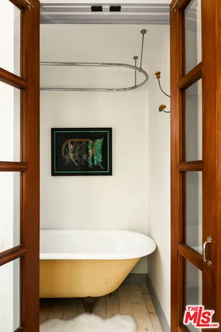 a bathroom with a sink and a shower