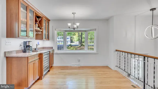 a view of a kitchen from the hallway