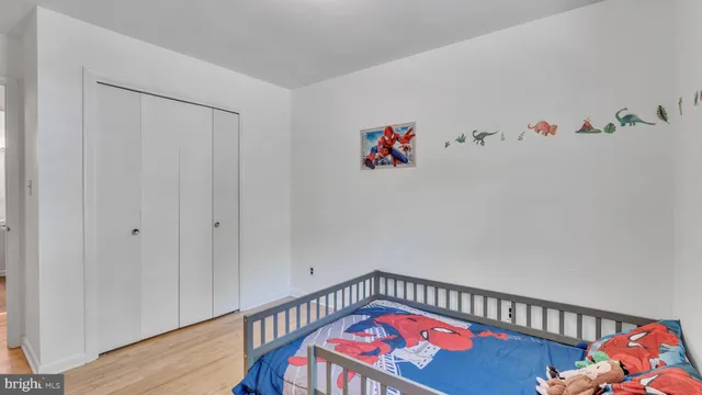 a hallway with toys and wooden floor