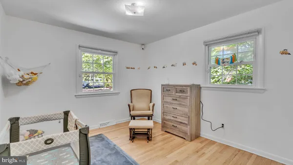 a room with furniture and a window