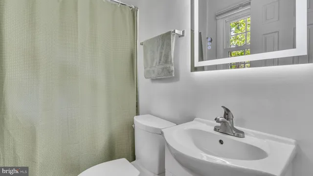 a bathroom with a sink and a toilet