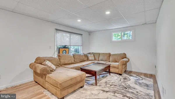 a living room with furniture and a couch