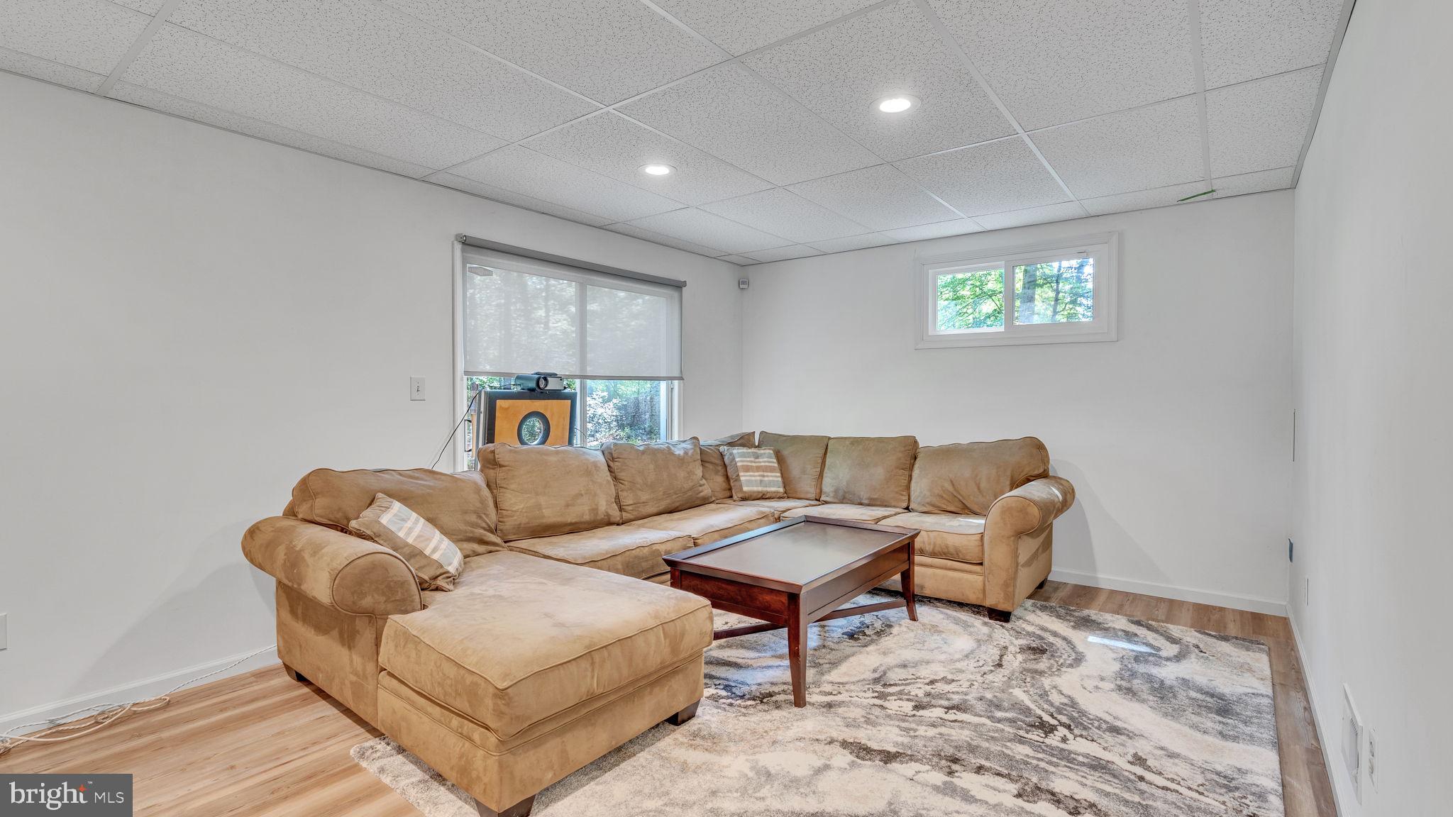 24680 Morgan Road Hollywood, MD 20636 - Photo 24 of 34 a living room with furniture and a couch