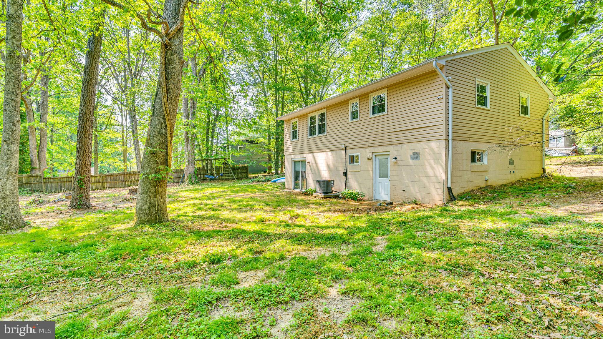 24680 Morgan Road Hollywood, MD 20636 - Photo 29 of 34 a backyard of a house with table and chairs
