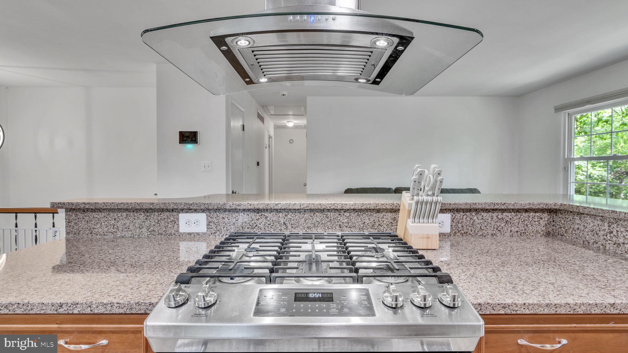 24680 Morgan Road Hollywood, MD 20636 - Photo 6 of 34 a white stove top oven sitting inside of a kitchen