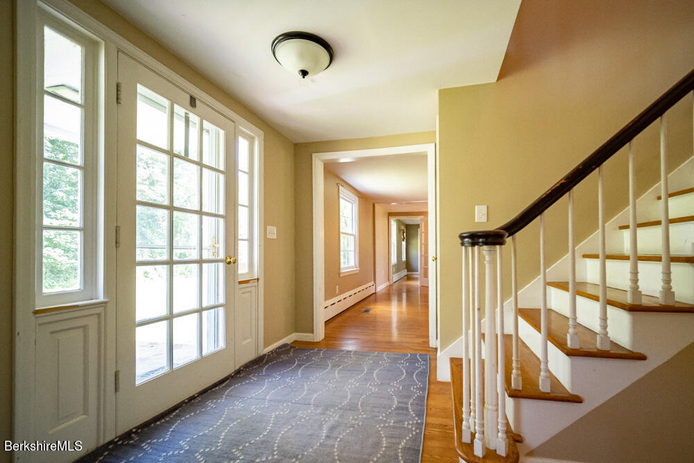 255 Spring Street Lee, MA 01238 - Photo 3 of 38 center hall to living room