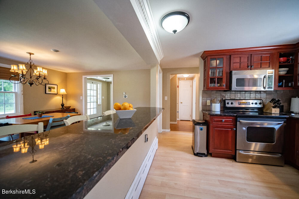 255 Spring Street Lee, MA 01238 - Photo 9 of 38 kitchen and island bar