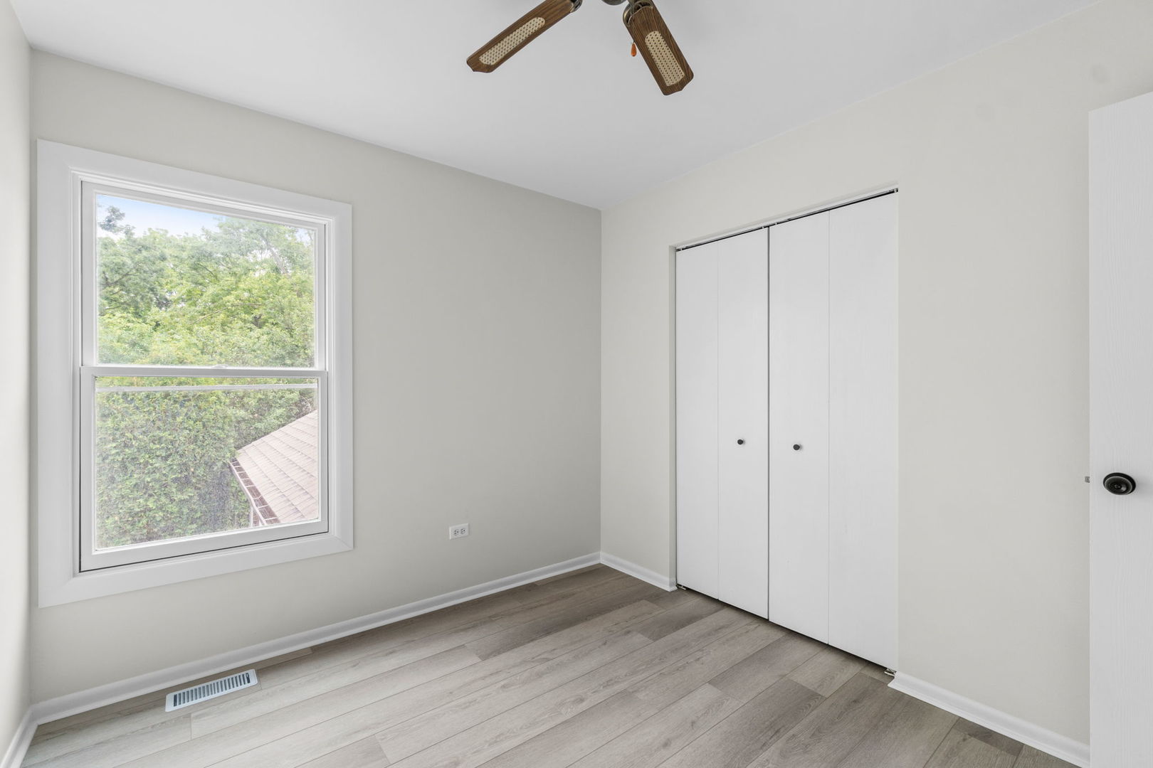 2254 Blacksmith Drive Wheaton, IL 60189 - Photo 22 of 32 a view of room with hardwood floor and window