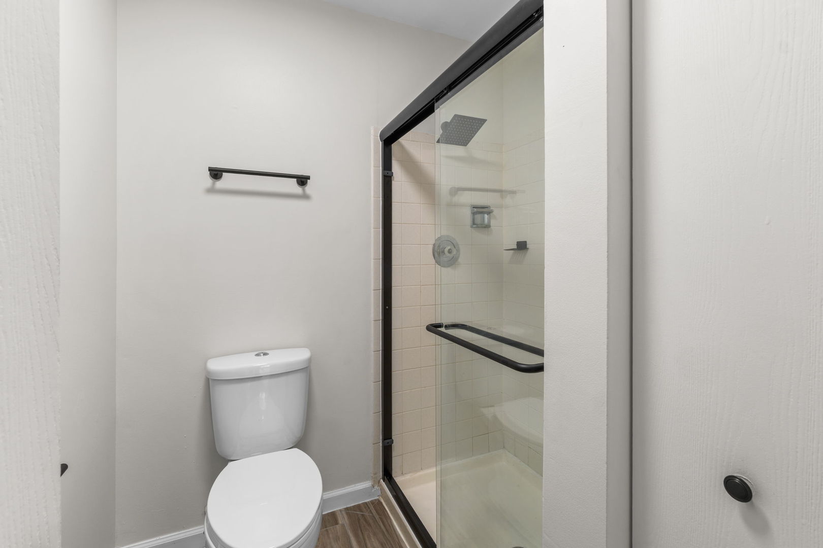 2254 Blacksmith Drive Wheaton, IL 60189 - Photo 29 of 32 a white toilet sitting next to a bathroom sink