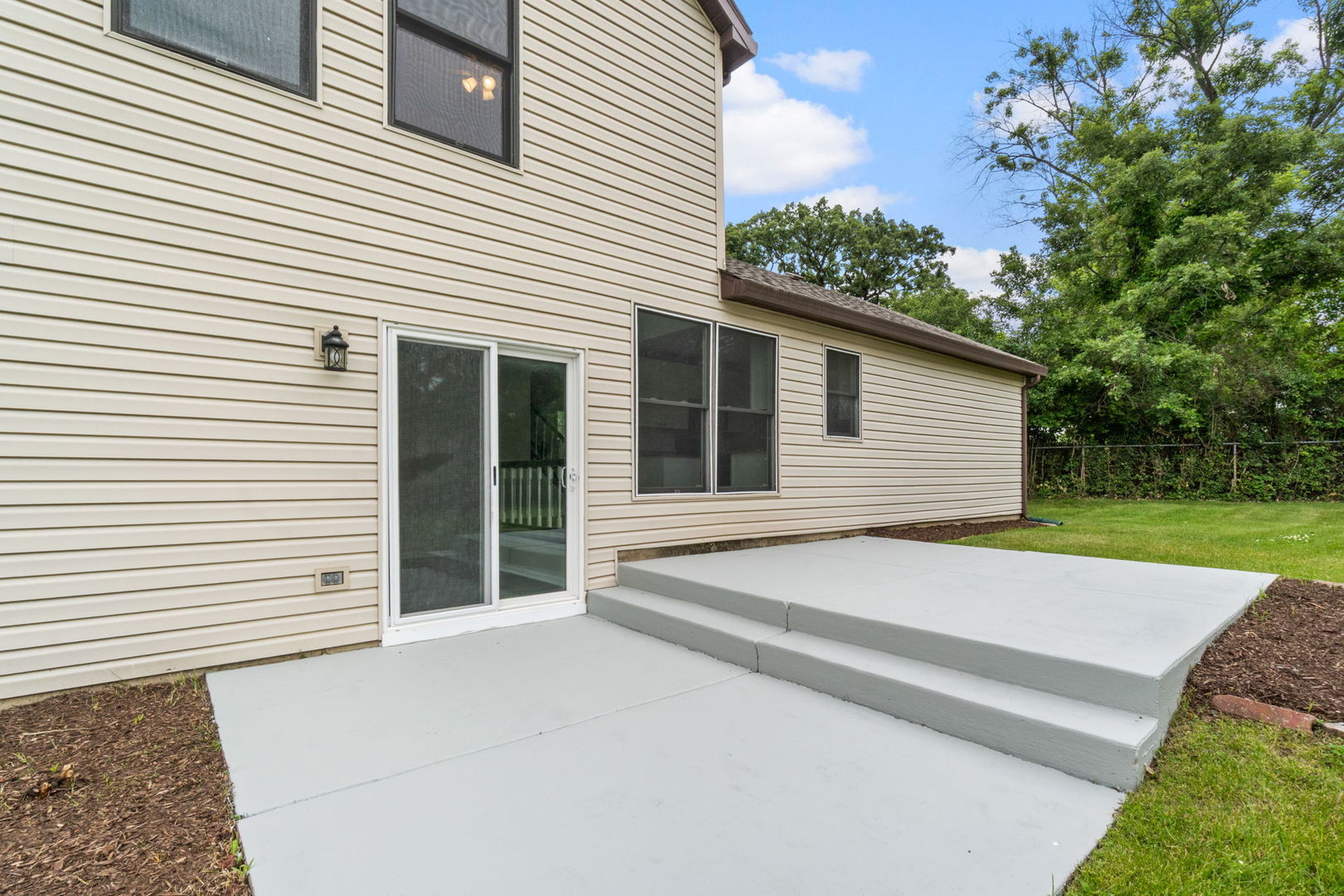 2254 Blacksmith Drive Wheaton, IL 60189 - Photo 31 of 32 a front view of a house with a garage