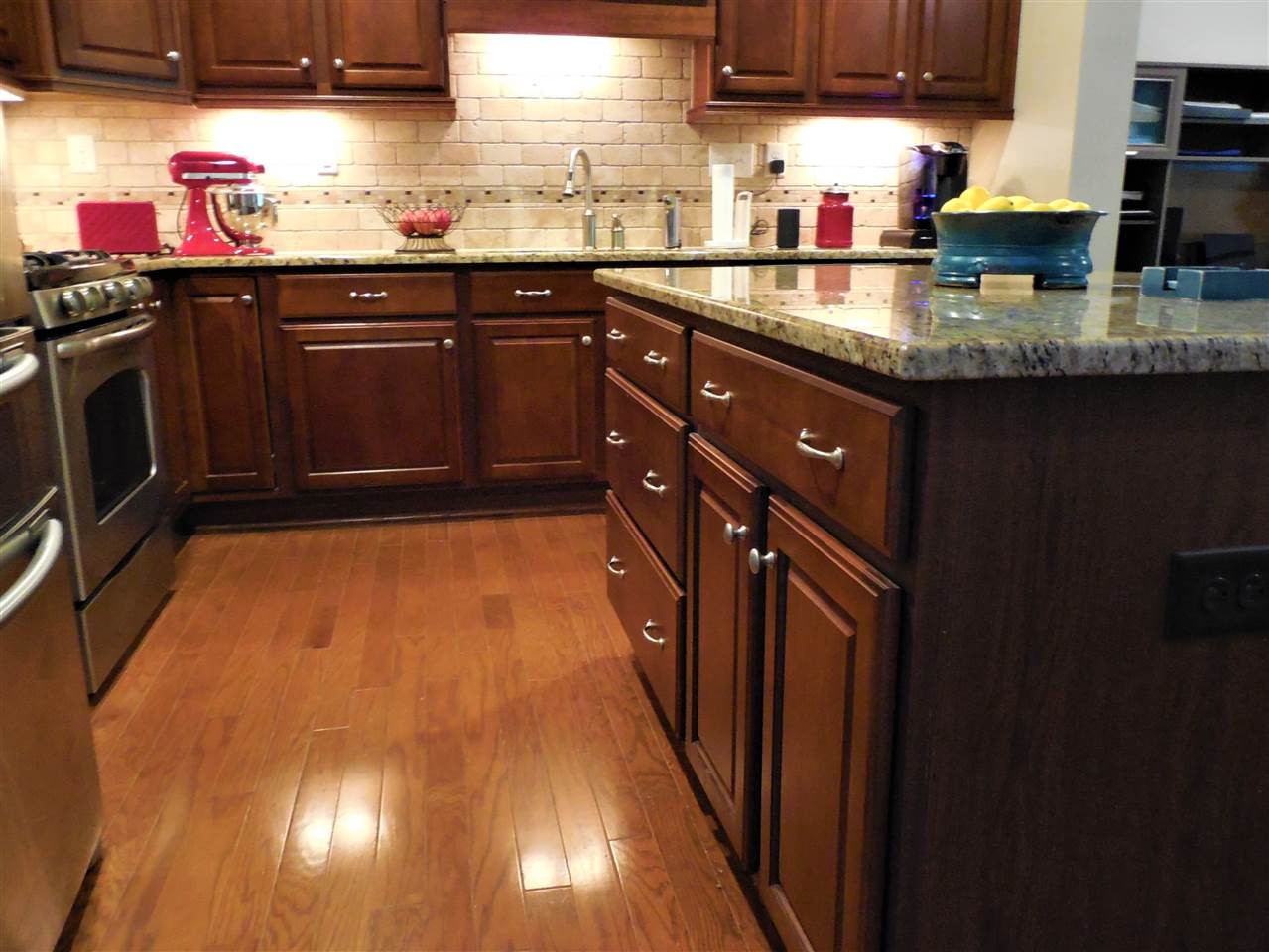 1235 Silver Beach Way Raleigh, NC 27606 - Photo 4 of 30 Plenty of Storage in this Island! Custom Pull-Out inserts in these Kitchen cabinets! Kitchen Island