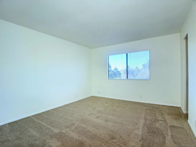 a view of a swimming pool with a sitting area