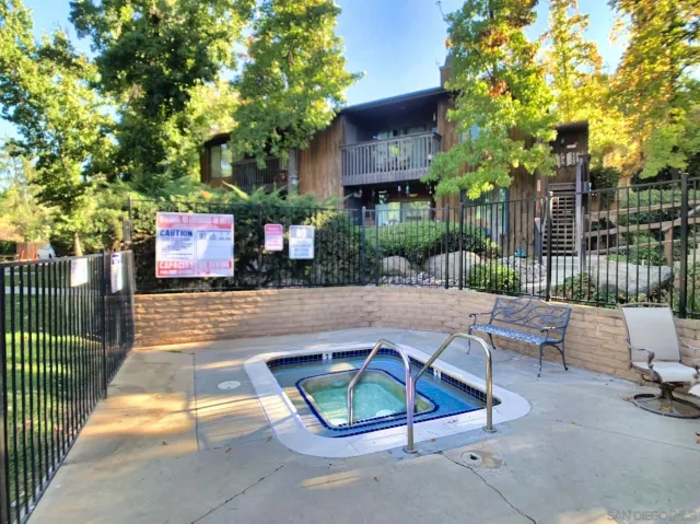 a view of yard with patio