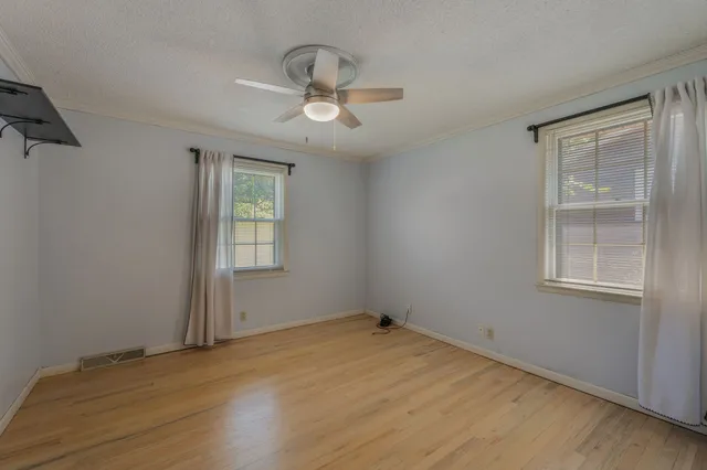 an empty room with windows