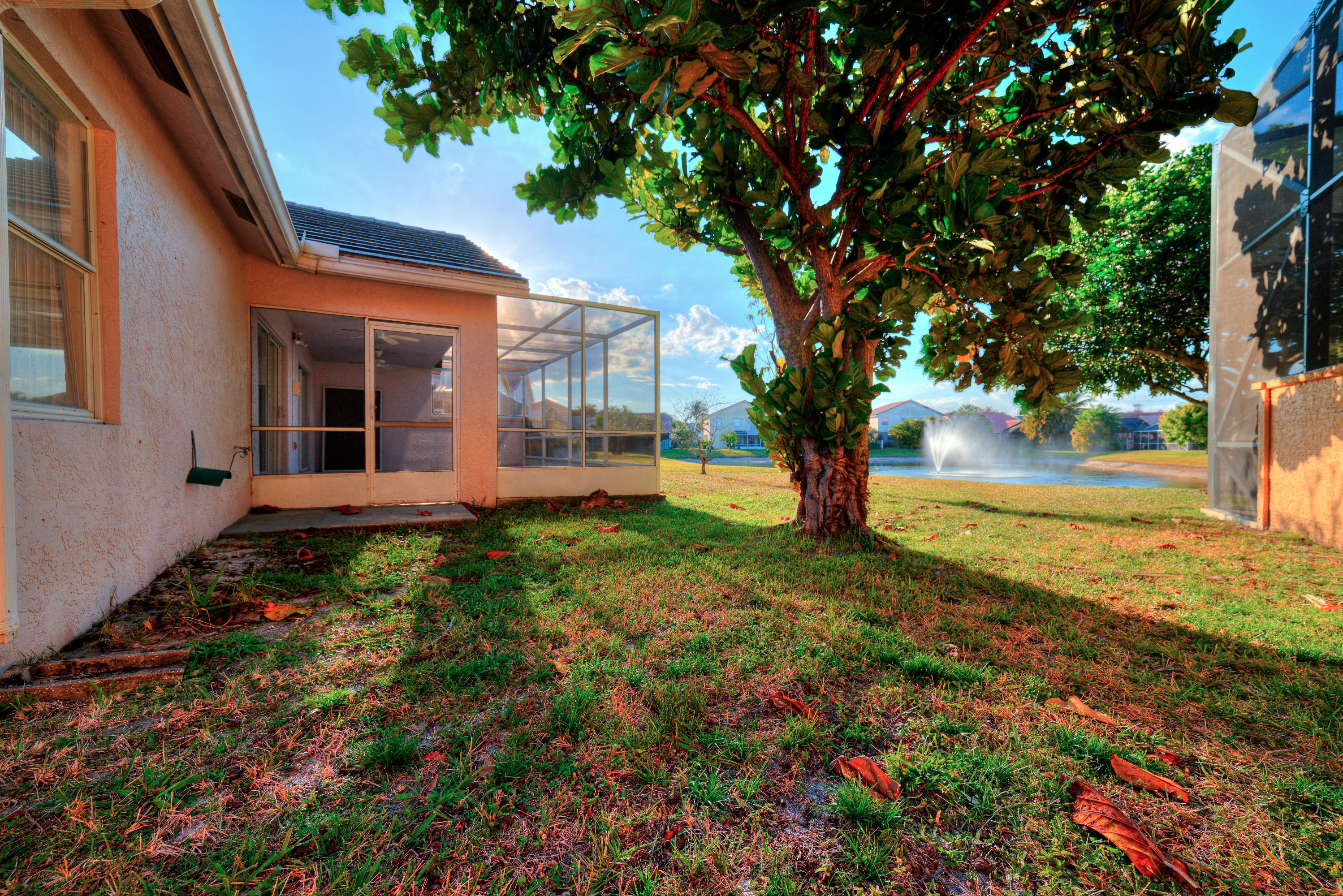 18358 Fresh Lake Way Boca Raton, FL 33498 - Photo 26 of 35 backyard with screened in patio