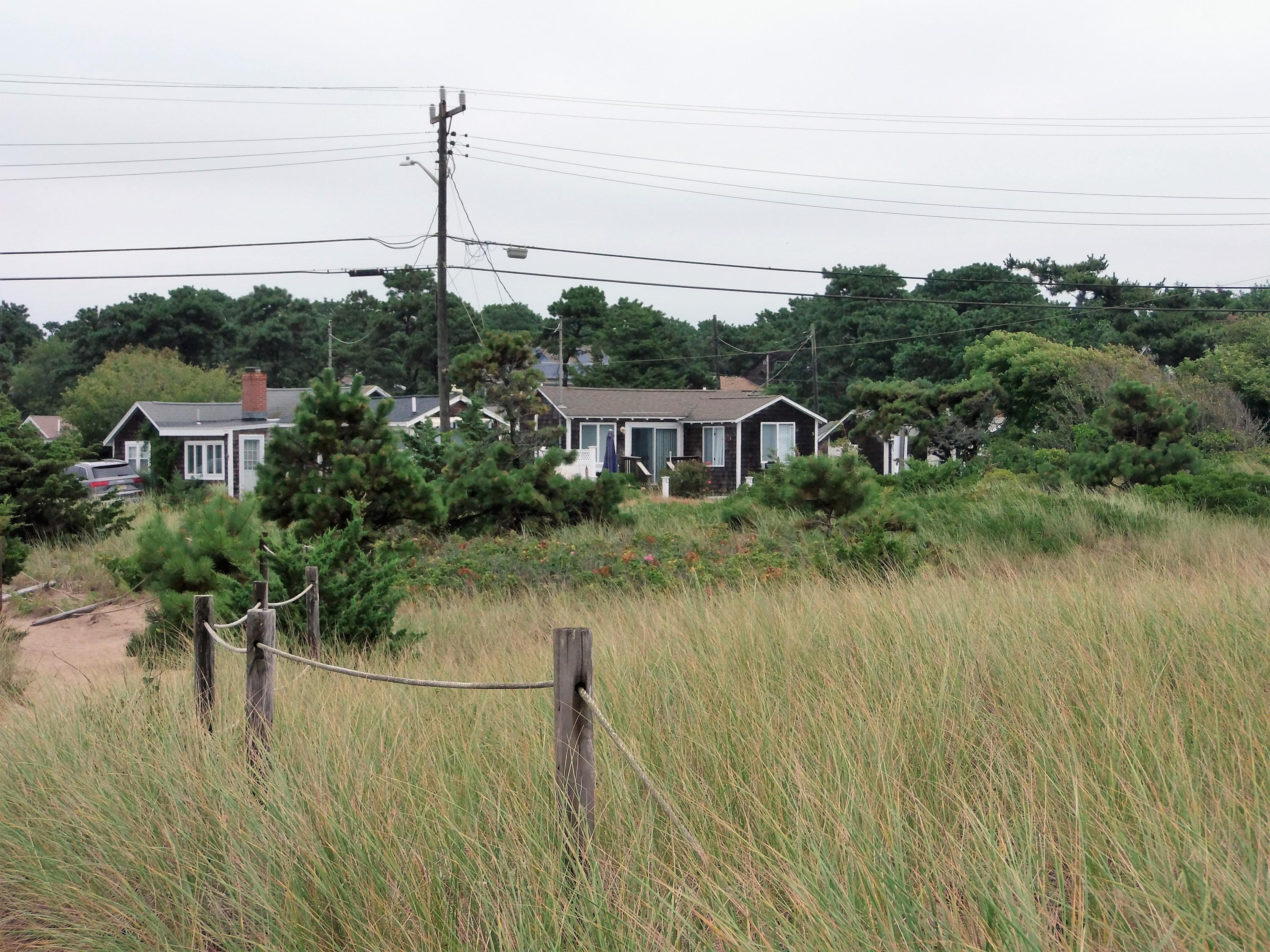 94 Old Wharf Road, Unit U1 Dennis Port, MA 02639 - Photo 8 of 10 a view of lake and mountain in the back
