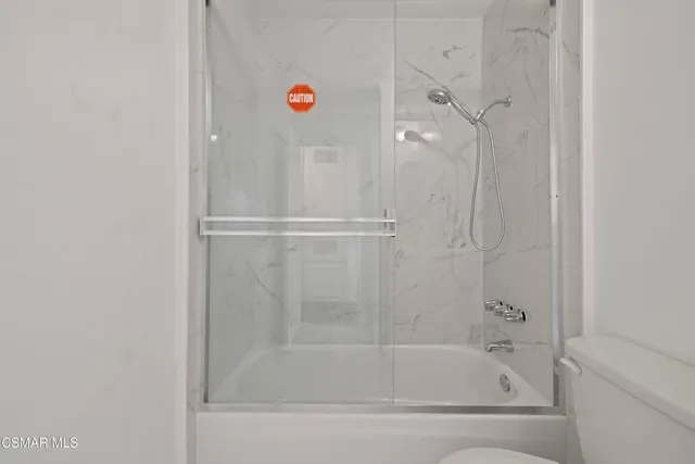 a close up of a bathtub in bathroom