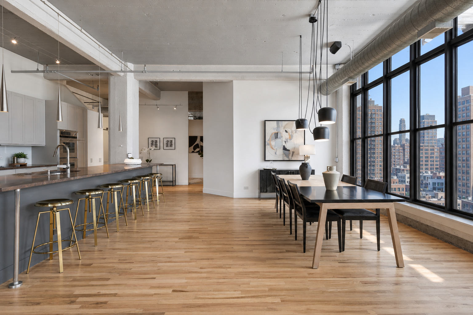 850 West Adams Street, Unit 4A Chicago, IL 60607 - Photo 16 of 52 a view of a dining room with furniture and wooden floor
