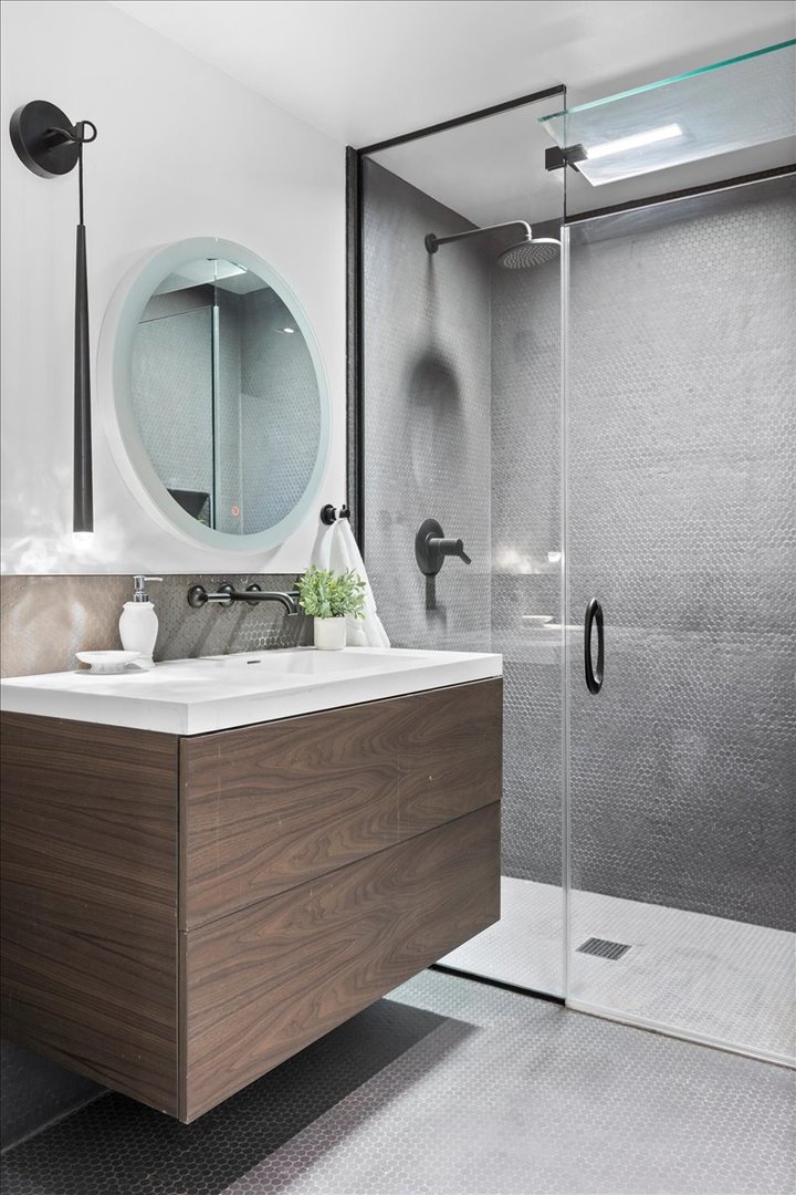 850 West Adams Street, Unit 4A Chicago, IL 60607 - Photo 49 of 52 a bathroom with a double vanity sink mirror and shower