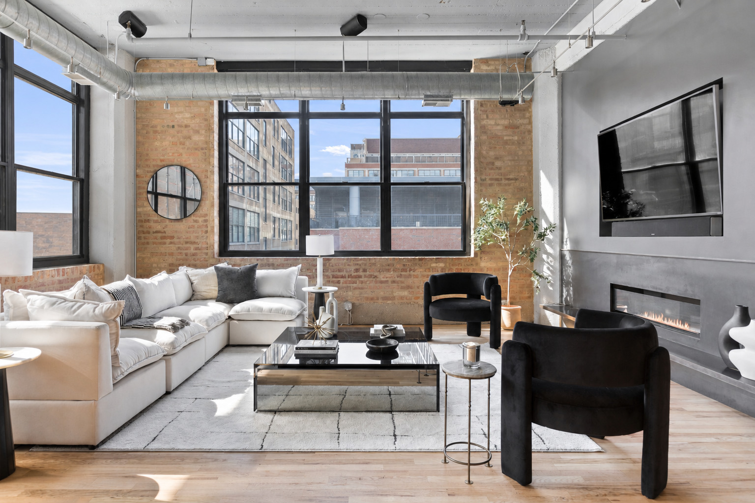850 West Adams Street, Unit 4A Chicago, IL 60607 - Photo 9 of 52 a living room with furniture and large windows