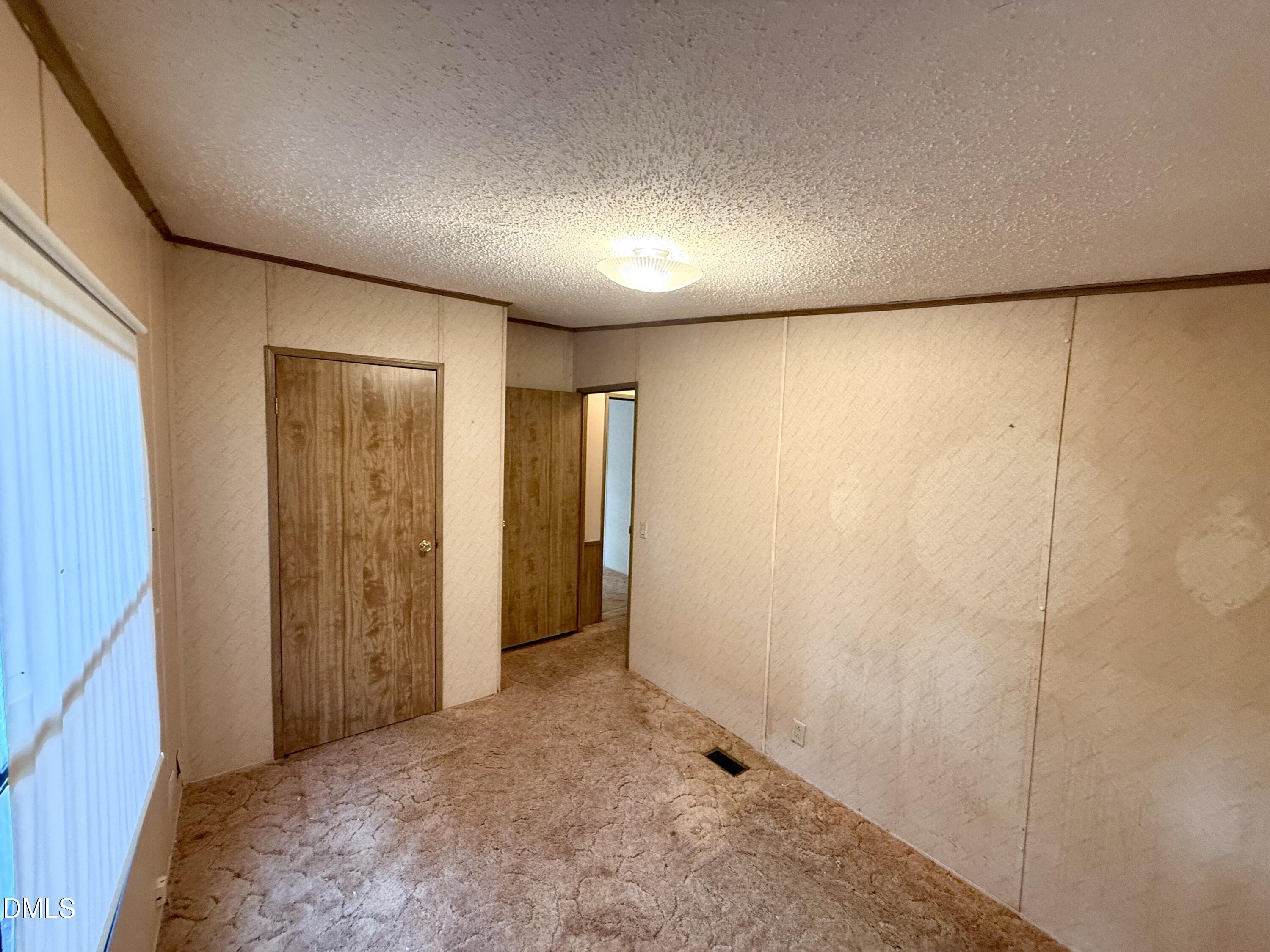 1969 Bagley Road Kenly, NC 27542 - Photo 20 of 23 an empty room with closet