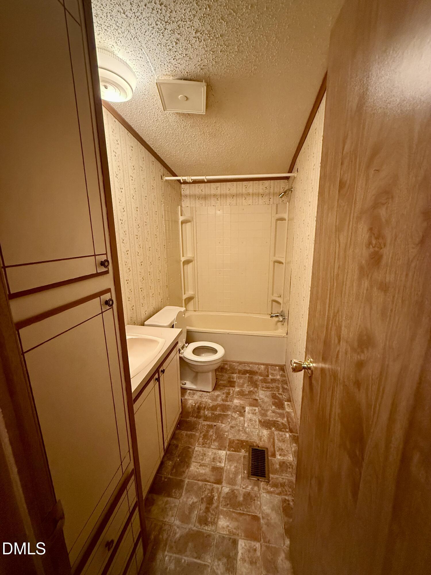 1969 Bagley Road Kenly, NC 27542 - Photo 21 of 23 a bathroom with a sink and a shower