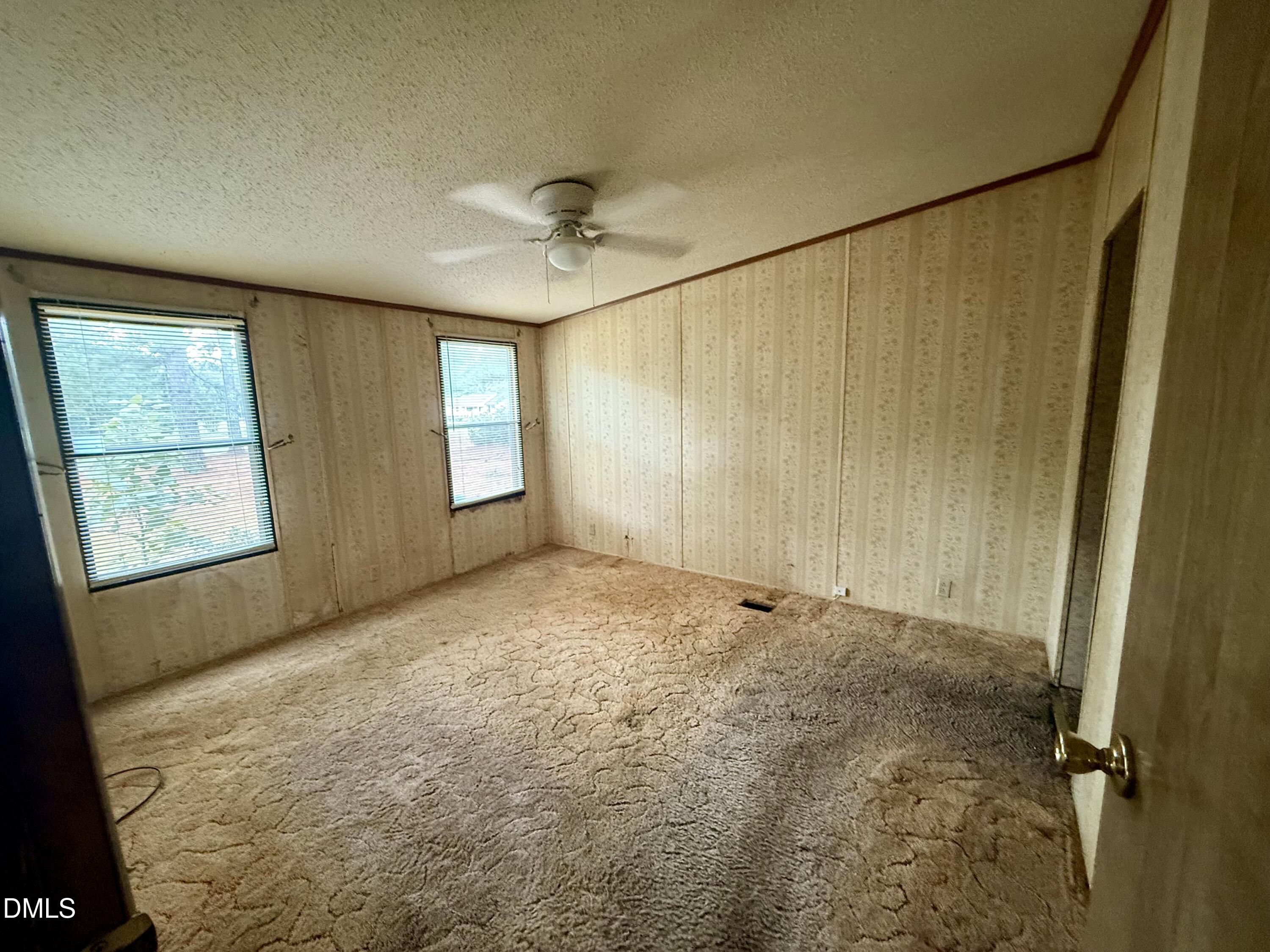 1969 Bagley Road Kenly, NC 27542 - Photo 22 of 23 a view of an empty room and window