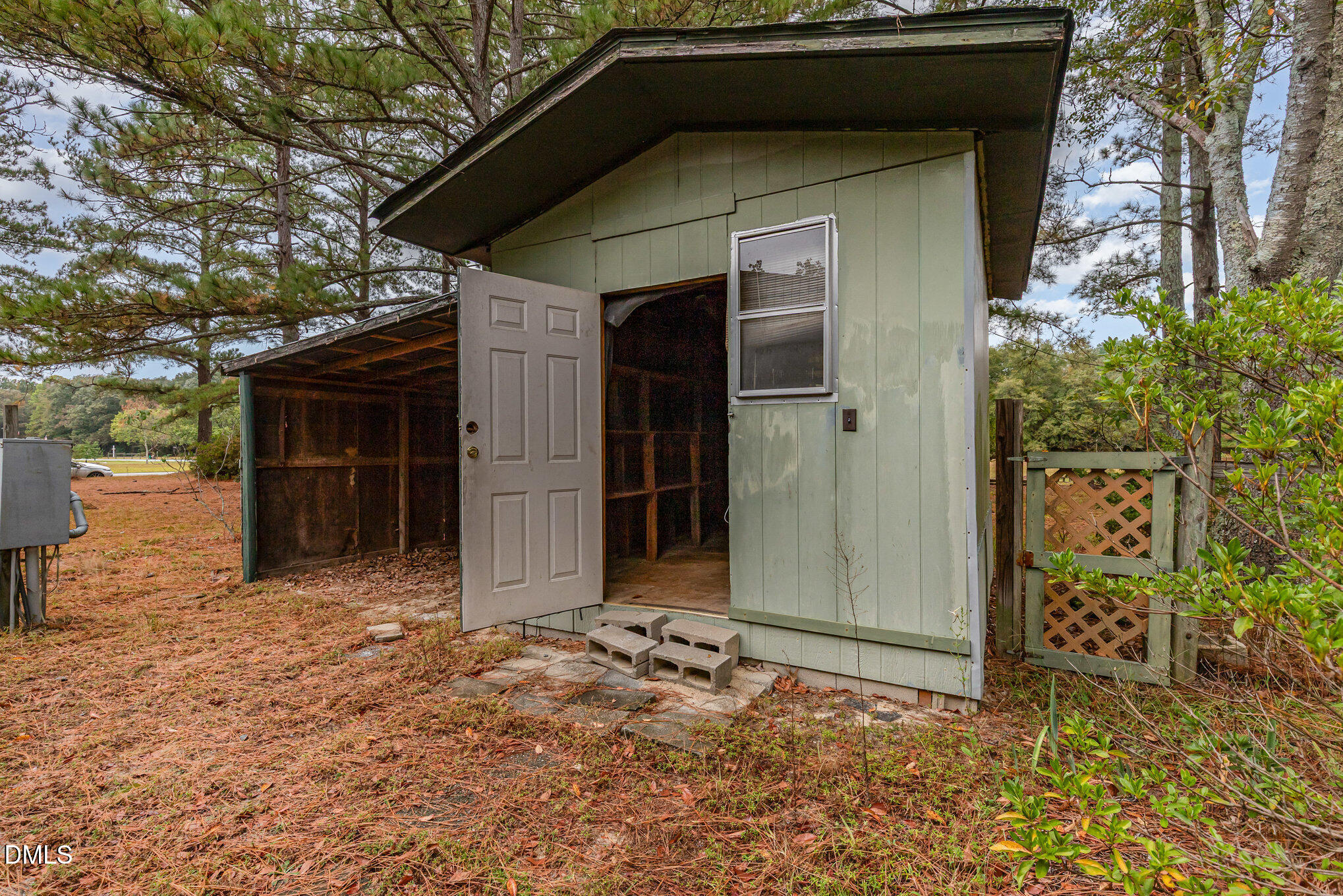 1969 Bagley Road Kenly, NC 27542 - Photo 10 of 23 a house with trees in front of it