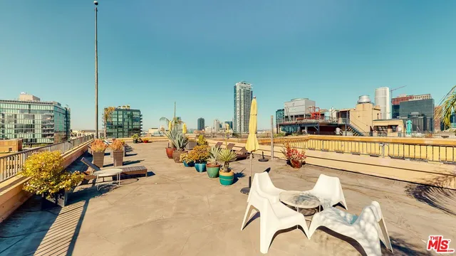 a view of a terrace with chairs