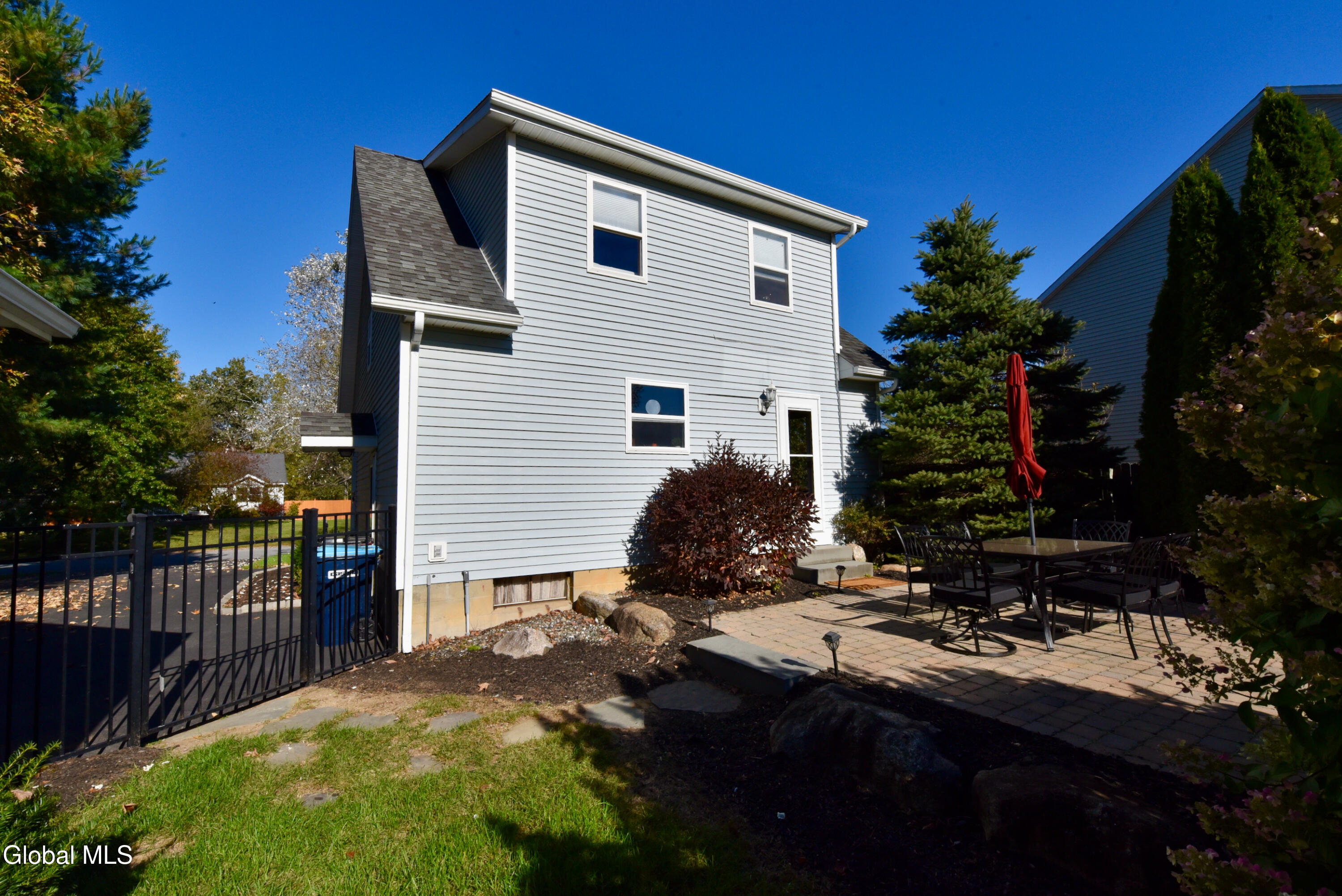 10 New Kent Road Wilton, NY 12831 - Photo 32 of 37 10NewKentBackPatioDriveway