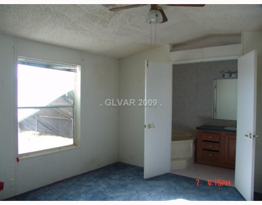 3921 North Blagg Road Pahrump, NV 89060 - Photo 6 of 14 Master Bedroom.