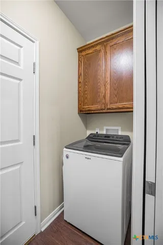 a utility room with washer and dryer