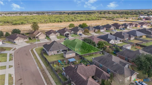 an aerial view of multiple house
