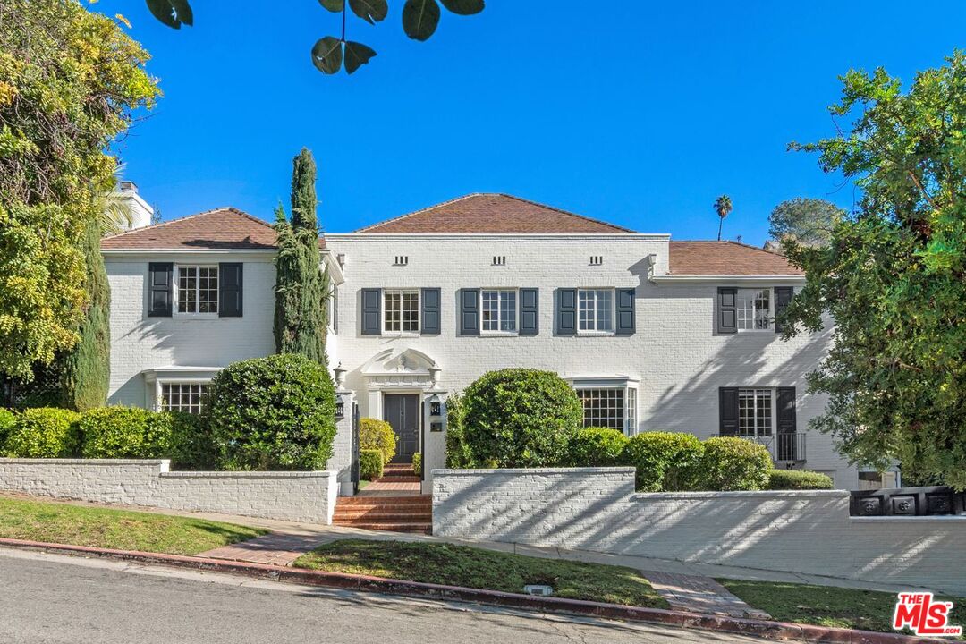1910 Outpost Drive Los Angeles, CA 90068 - Photo 1 of 27 front view of a house with a yard