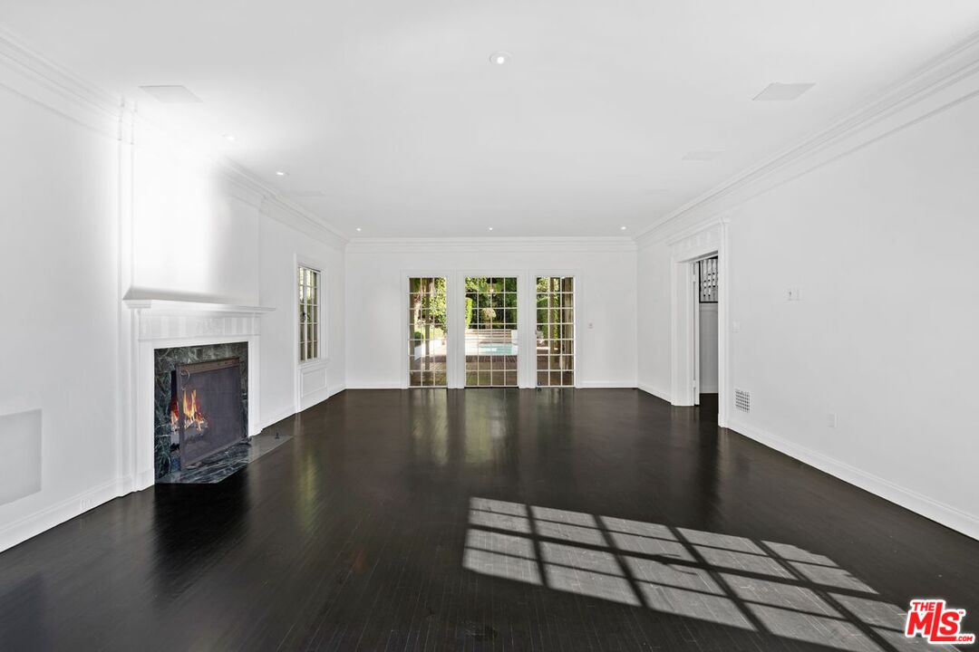 1910 Outpost Drive Los Angeles, CA 90068 - Photo 4 of 27 a view of livingroom with furniture wooden floor and window