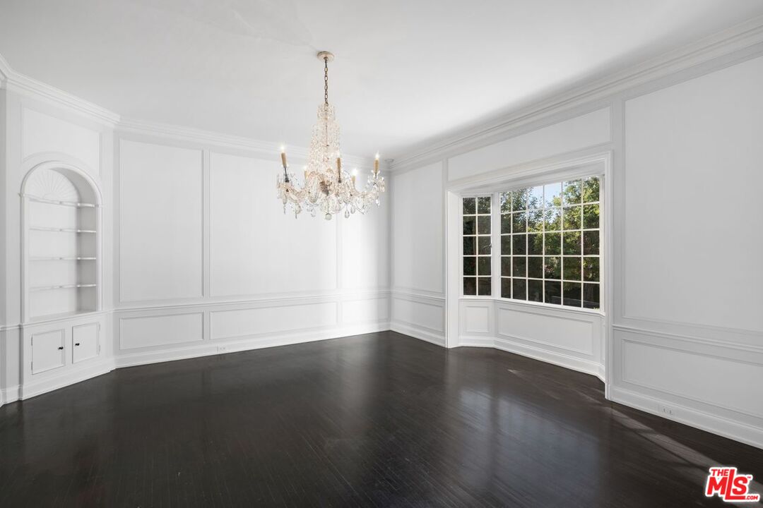 1910 Outpost Drive Los Angeles, CA 90068 - Photo 6 of 27 a view of wooden floor chandelier and windows in a room