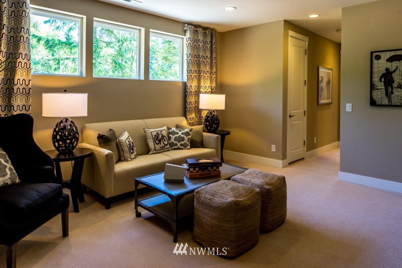 5633 196th Street Southeast, Unit 31 Bothell, WA 98012 - Photo 23 of 25 a living room with furniture and a window