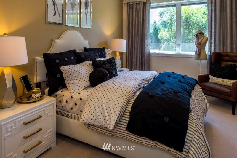 5633 196th Street Southeast, Unit 31 Bothell, WA 98012 - Photo 24 of 25 a bedroom with a bed and a window