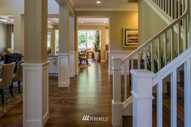 5633 196th Street Southeast, Unit 31 Bothell, WA 98012 - Photo 5 of 25 a view of entryway and hall with wooden floor