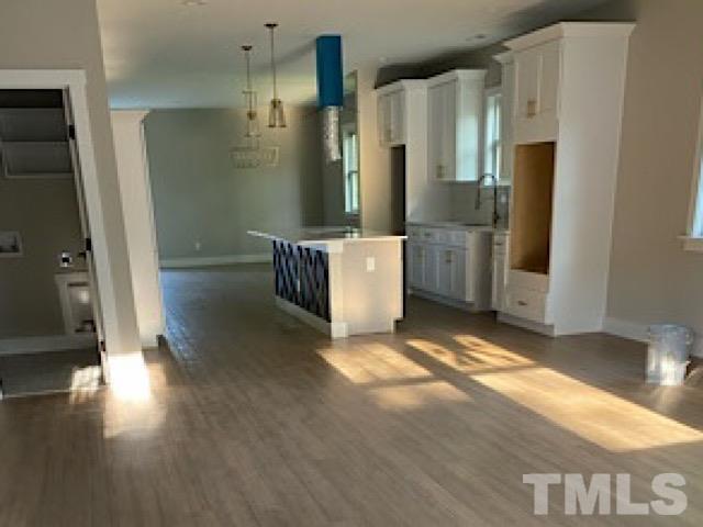 725 Church Street Raleigh, NC 27601 - Photo 2 of 21 a bathroom with a tub shower and sink