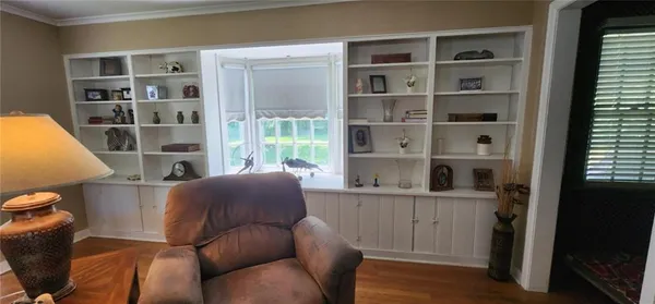 a room with furniture and window
